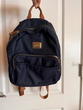 Calvin Klein Navy Backpack with Tan Leather Accents